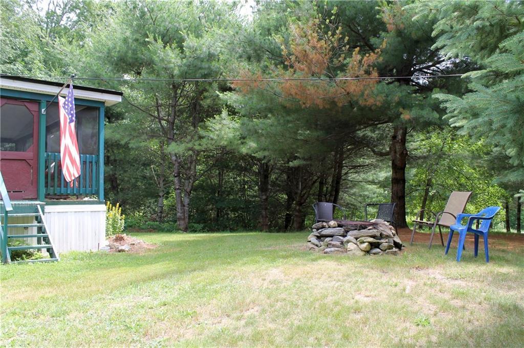 178 Stevens Pond Road Liberty, ME 04949 - Photo 4 of 24 Enjoy evenings around the fire pit...