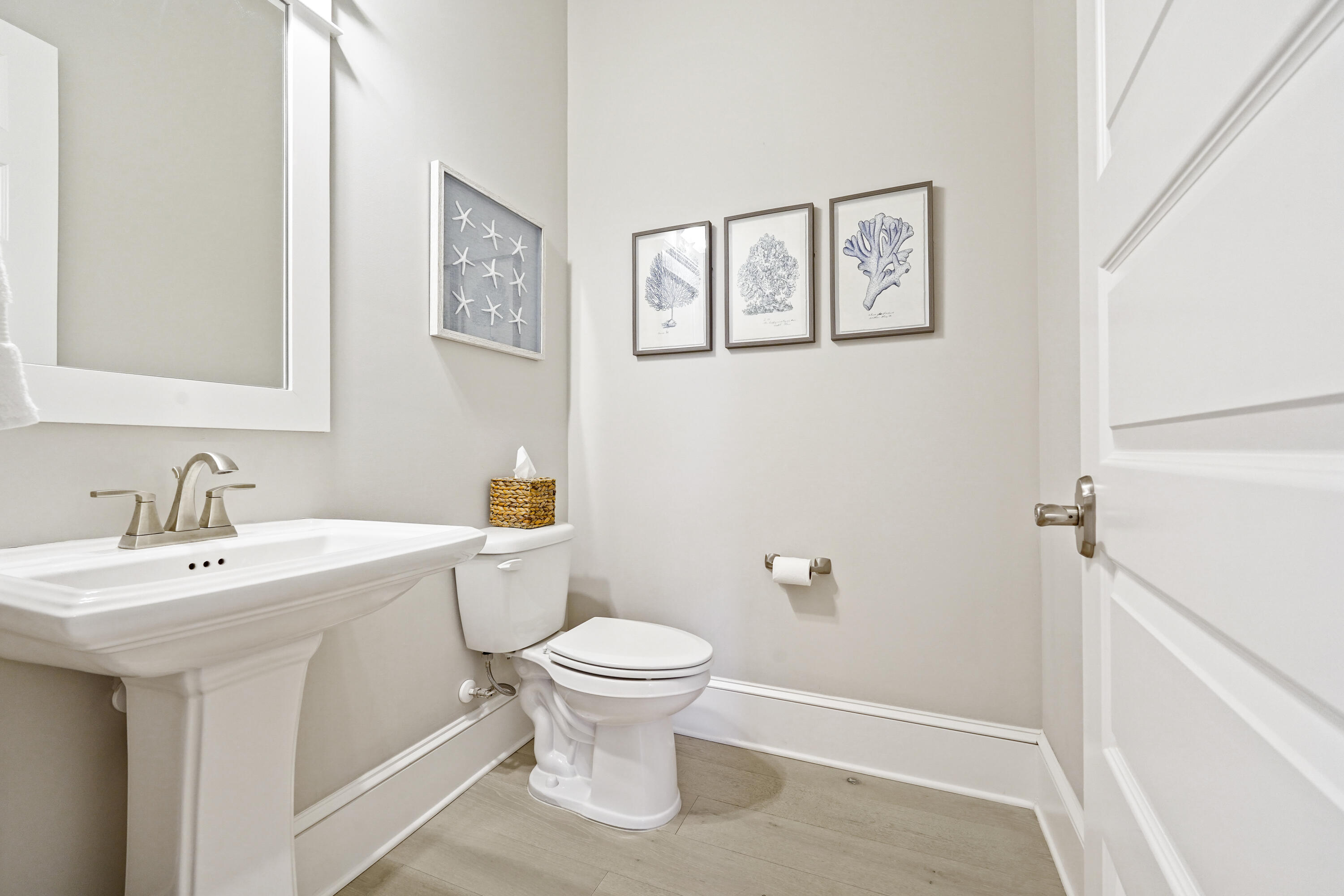 82 Siasconset Ln Inlet Beach Inlet Beach, FL 32461 - Photo 14 of 42 a bathroom with a toilet sink and mirror