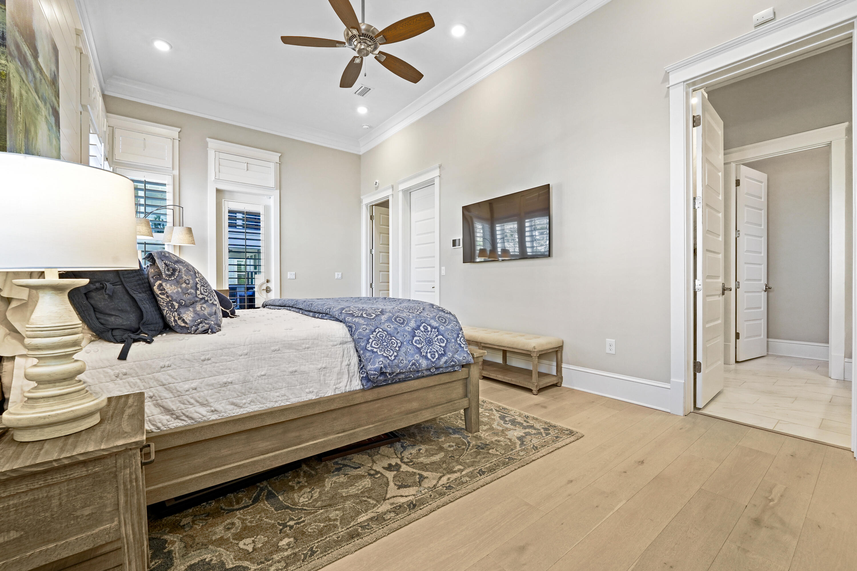 82 Siasconset Ln Inlet Beach Inlet Beach, FL 32461 - Photo 16 of 42 a bedroom with a bed and a chandelier