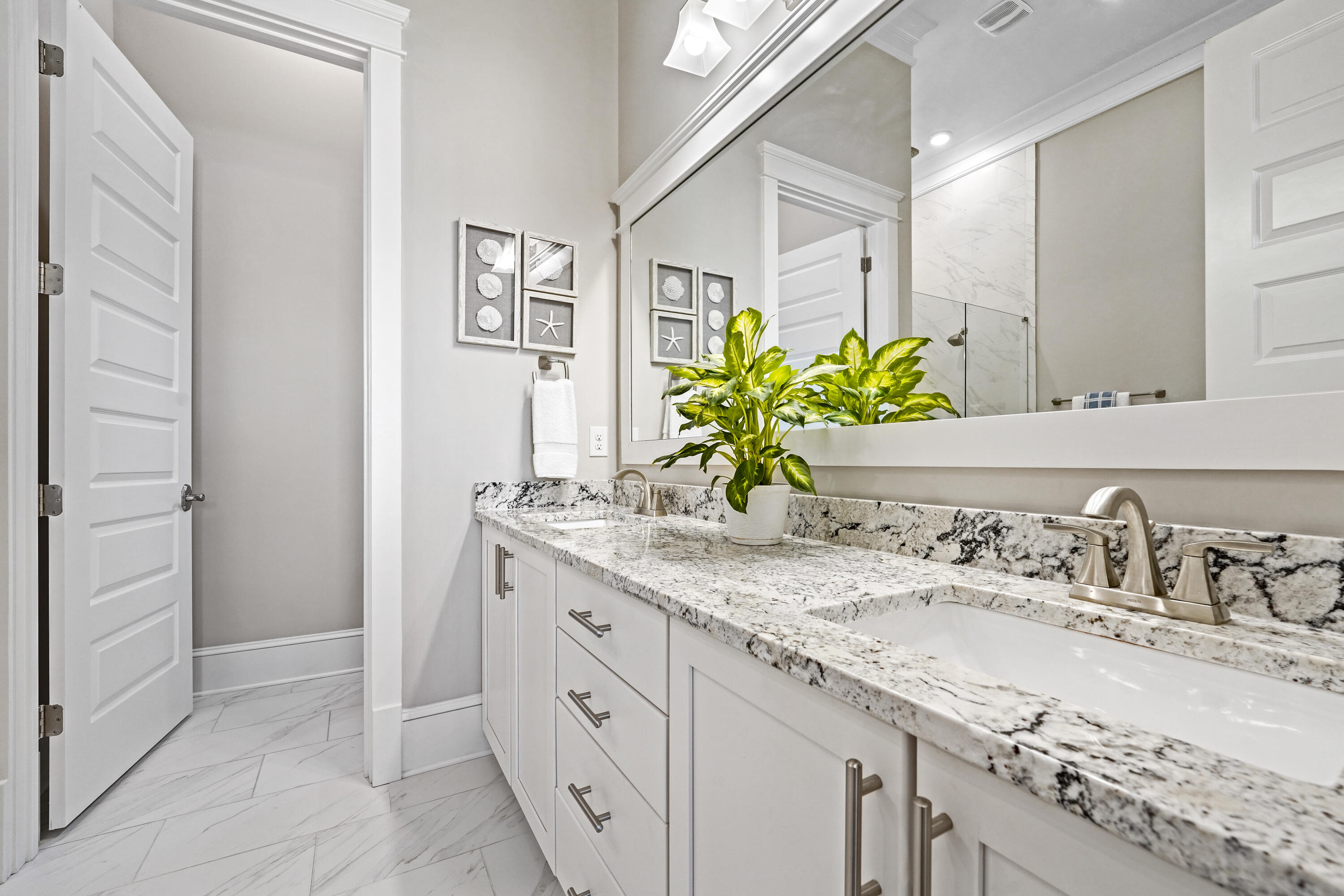 82 Siasconset Ln Inlet Beach Inlet Beach, FL 32461 - Photo 19 of 42 a bathroom with a granite countertop sink a mirror and a shower
