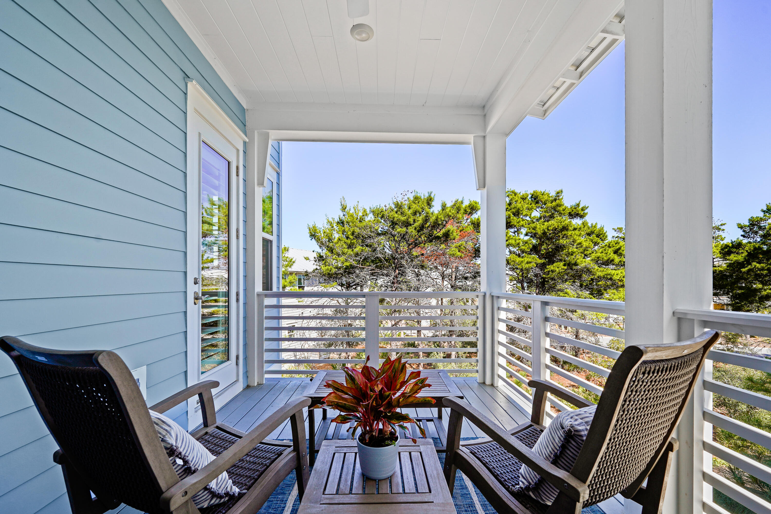 82 Siasconset Ln Inlet Beach Inlet Beach, FL 32461 - Photo 26 of 42 a view of a chairs and table in the balcony