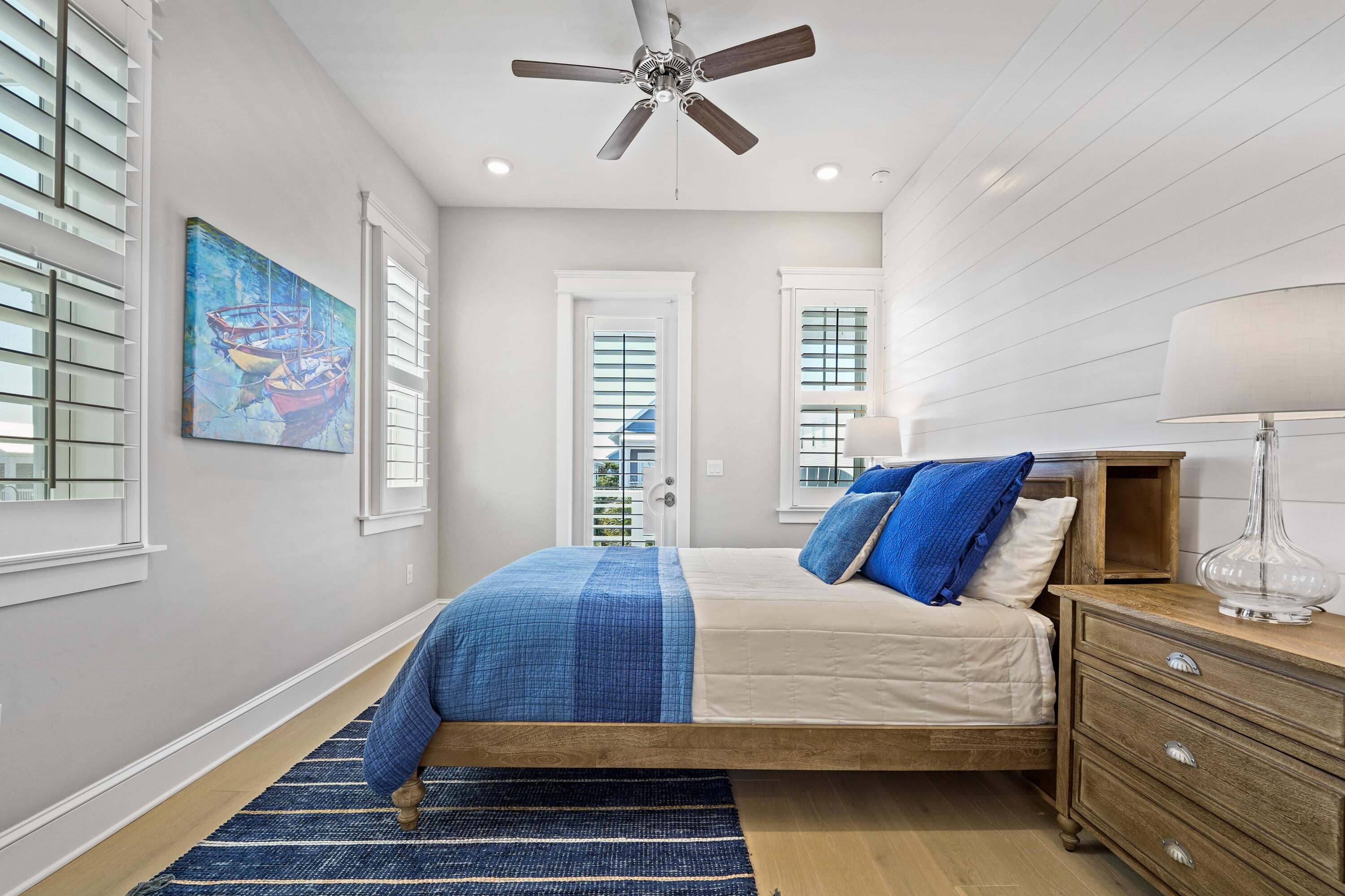 82 Siasconset Ln Inlet Beach Inlet Beach, FL 32461 - Photo 32 of 42 a bedroom with bed and wooden floor