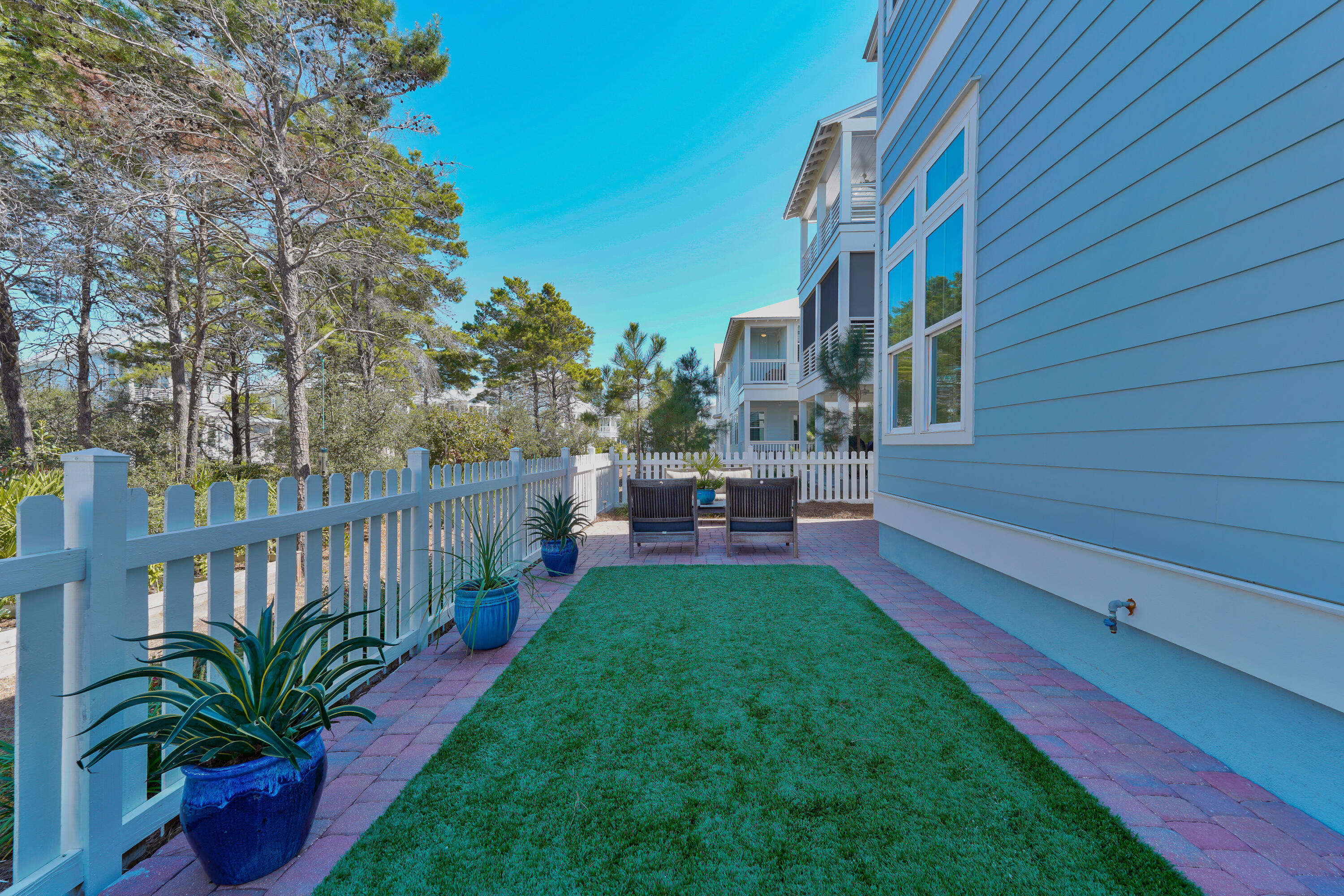 82 Siasconset Ln Inlet Beach Inlet Beach, FL 32461 - Photo 38 of 42 a view of an house with backyard and sitting area