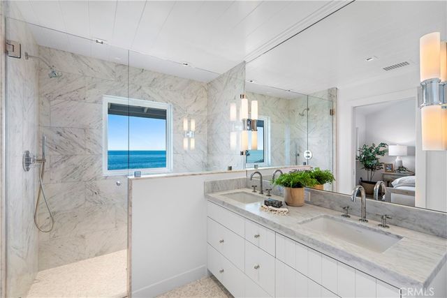 a bed room with a bed and a potted plant