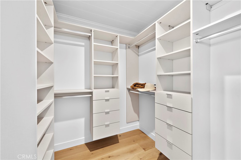 25 Blue Lagoon Laguna Beach, CA 92651 - Photo 32 of 53 a view of walk in closet with empty racks
