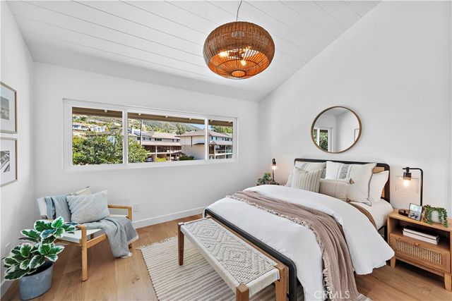 a bathroom with a shower and a glass door