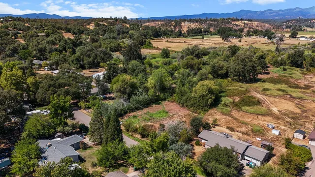 an aerial view of residential house with outdoor space