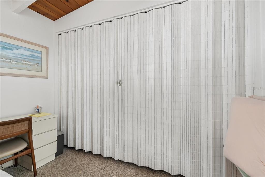 6006 Midnight Pass Road, Unit 11 Sarasota, FL 34242 - Photo 16 of 45 a view of a closet