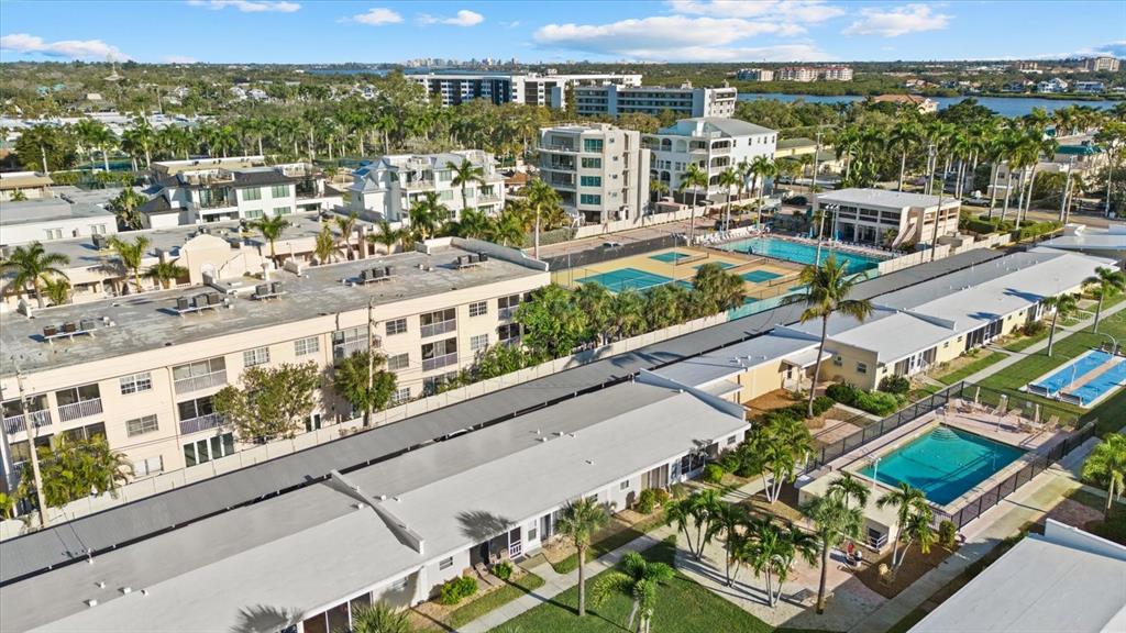 6006 Midnight Pass Road, Unit 11 Sarasota, FL 34242 - Photo 38 of 45 a view of a city with tall buildings