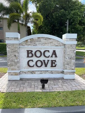 a view of a park with a sign board