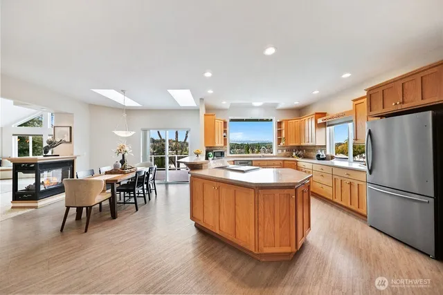 a kitchen with a sink stove and window