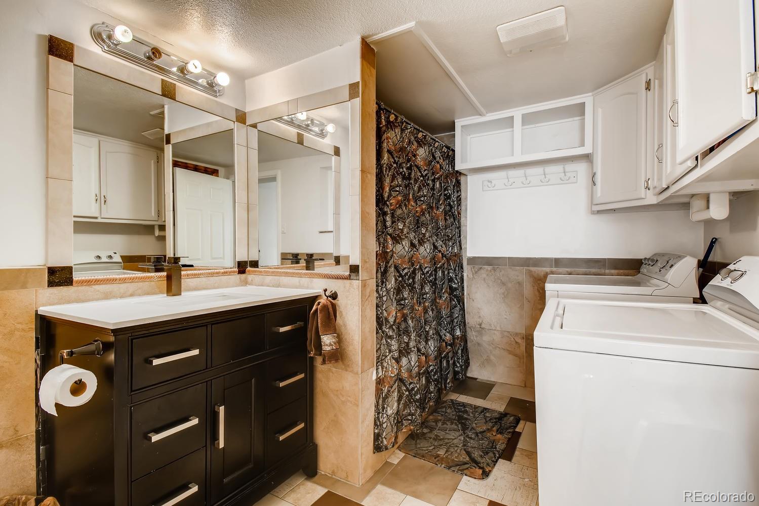 816 3rd Street Fort Lupton, CO 80621 - Photo 29 of 31 a kitchen with a sink stove and refrigerator