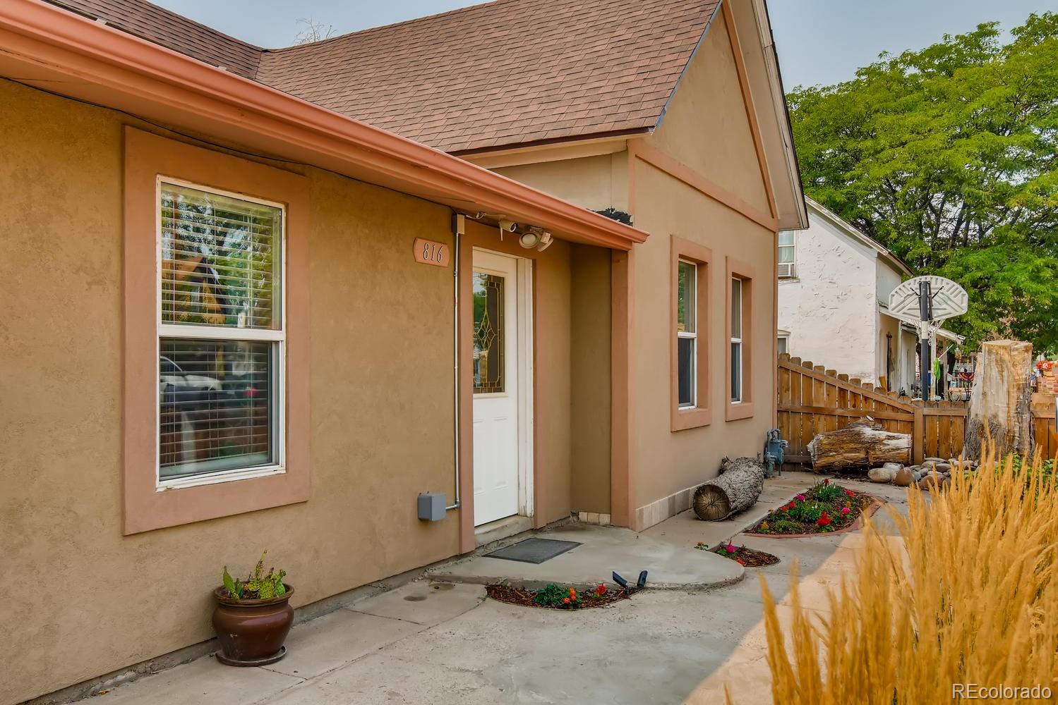 816 3rd Street Fort Lupton, CO 80621 - Photo 31 of 31 a view of a house with backyard