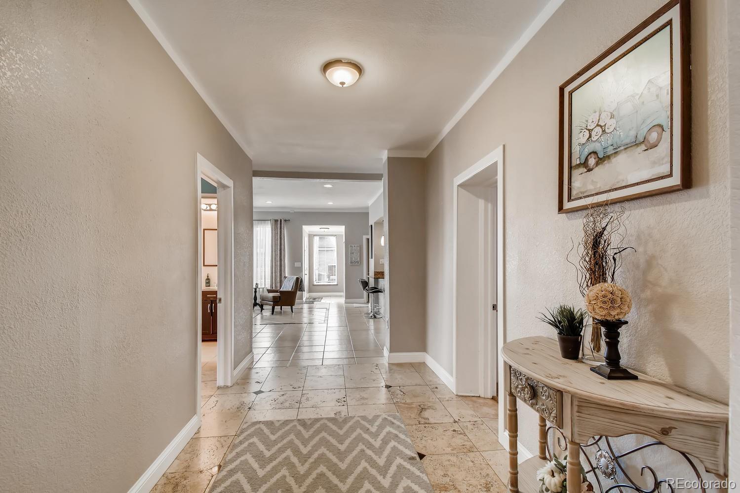 816 3rd Street Fort Lupton, CO 80621 - Photo 6 of 31 a view of a hallway with interior of the house