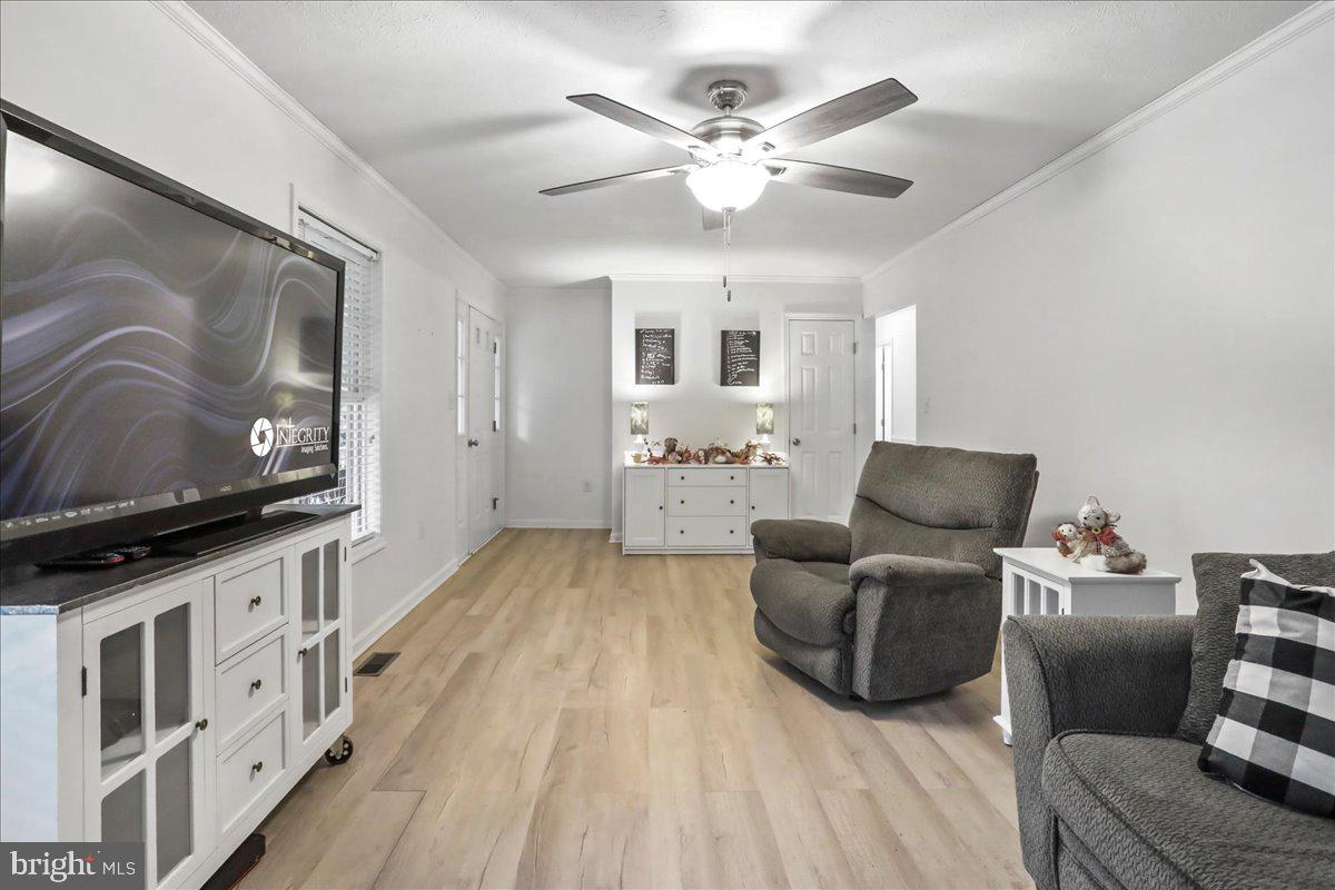 2726 Cave Ridge Road Mount Jackson, VA 22842 - Photo 15 of 39 a living room with furniture and a flat screen tv