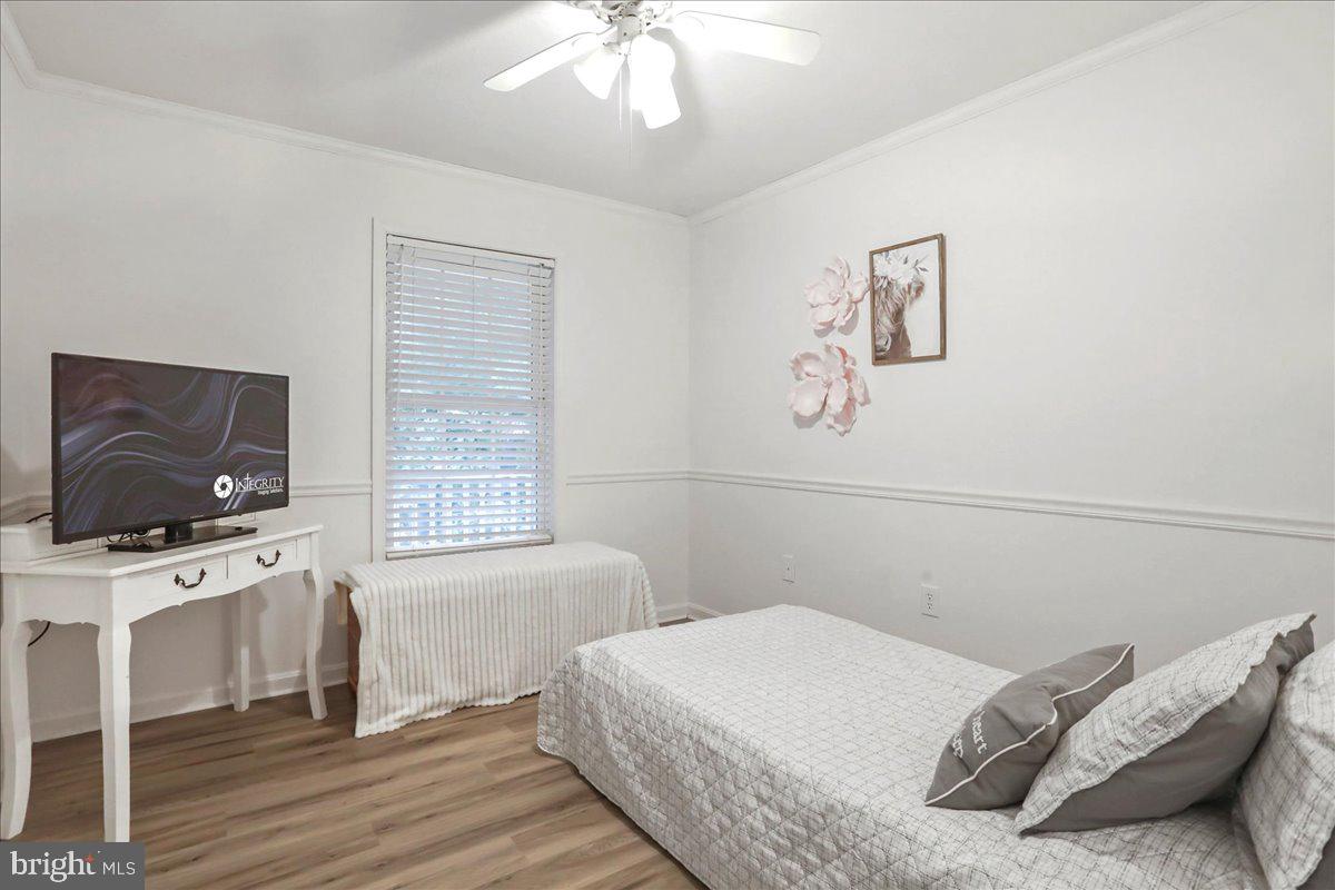 2726 Cave Ridge Road Mount Jackson, VA 22842 - Photo 17 of 39 a bedroom with a bed and a flat screen tv