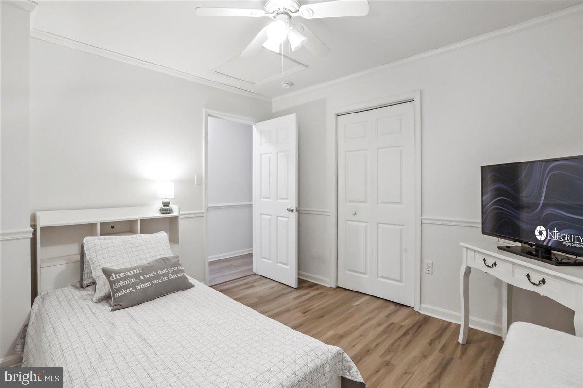 2726 Cave Ridge Road Mount Jackson, VA 22842 - Photo 18 of 39 a bedroom with a bed and a flat screen tv