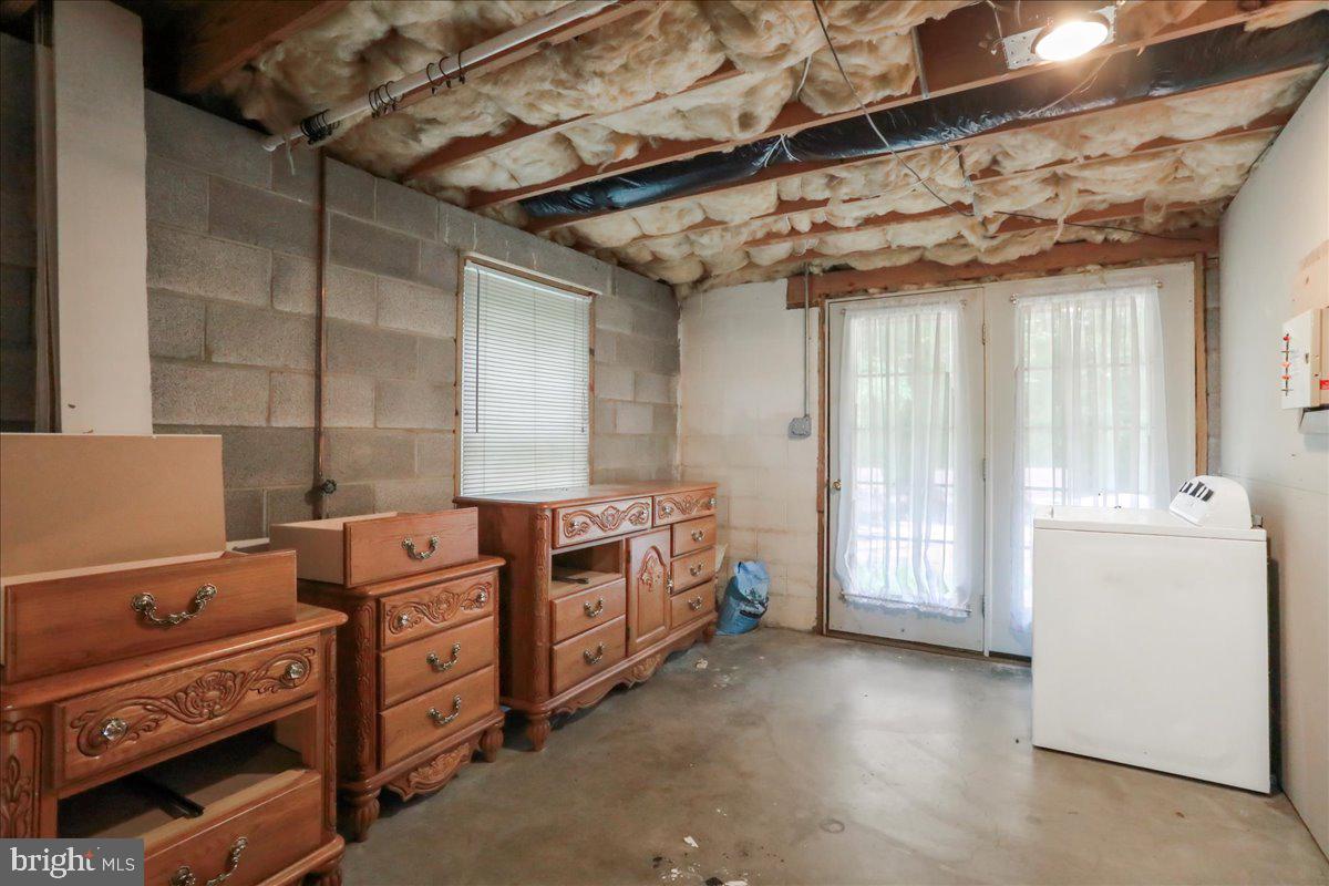 2726 Cave Ridge Road Mount Jackson, VA 22842 - Photo 28 of 39 a view of an empty room with furniture and a window