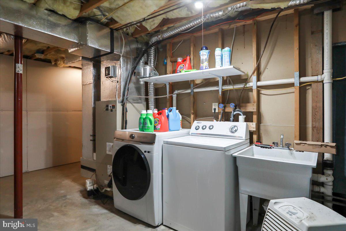 2726 Cave Ridge Road Mount Jackson, VA 22842 - Photo 29 of 39 a utility room with dryer and washer