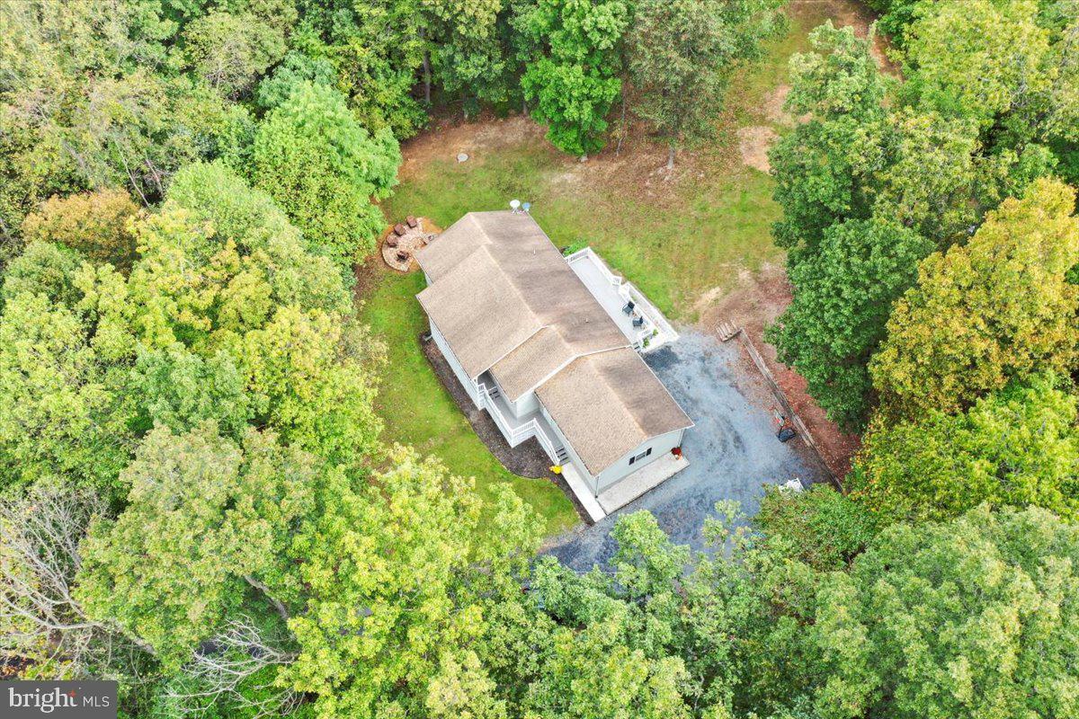 2726 Cave Ridge Road Mount Jackson, VA 22842 - Photo 39 of 39 a view of a lake with a building in the background