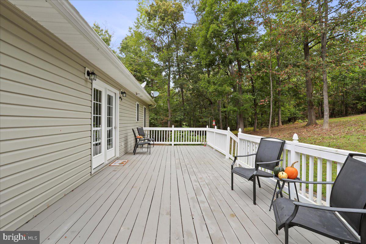 2726 Cave Ridge Road Mount Jackson, VA 22842 - Photo 4 of 39 a view of a chairs on the roof deck