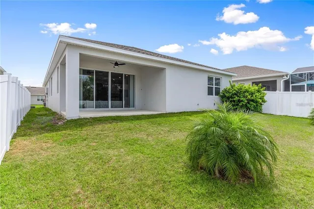a view of a house with a garden