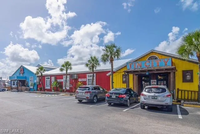 a view of a car park in front of house