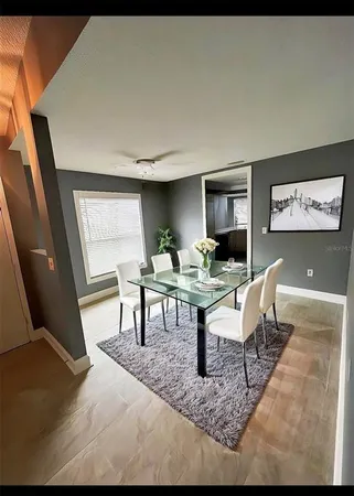 a view of a livingroom with furniture and window