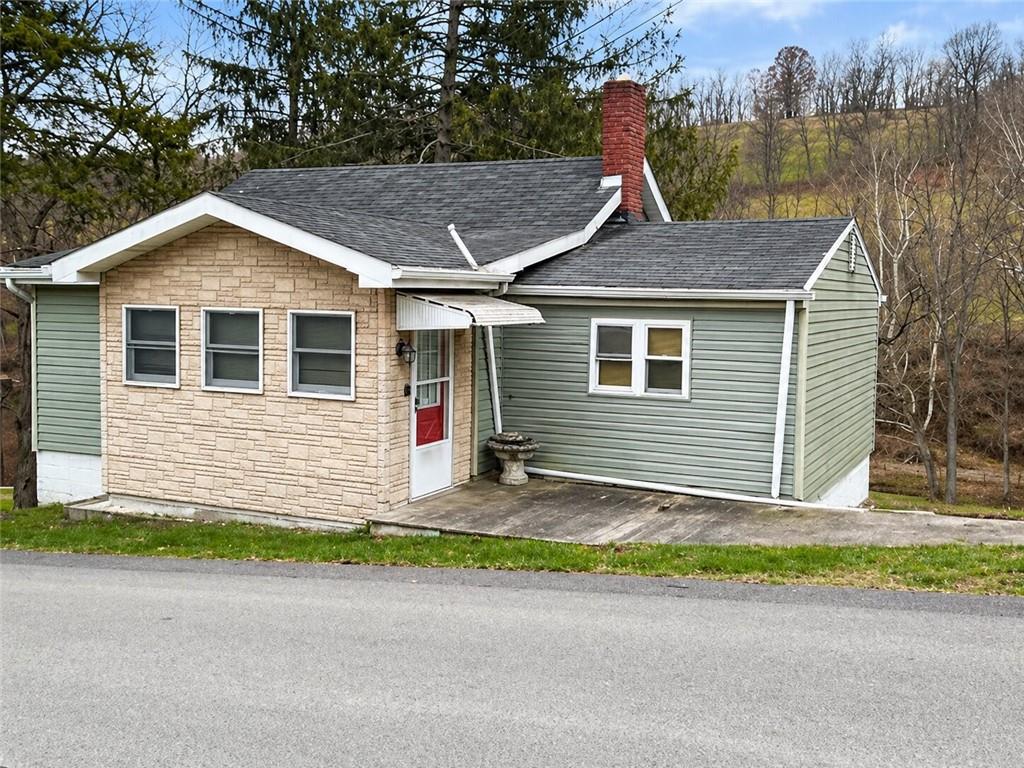 101 Fishpot Road Fredericktown, PA 15333 - Photo 1 of 21 a view of outdoor space yard and front view of a house
