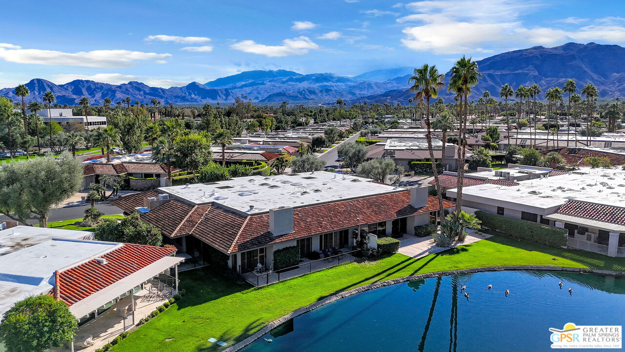a view of a houses with a yard