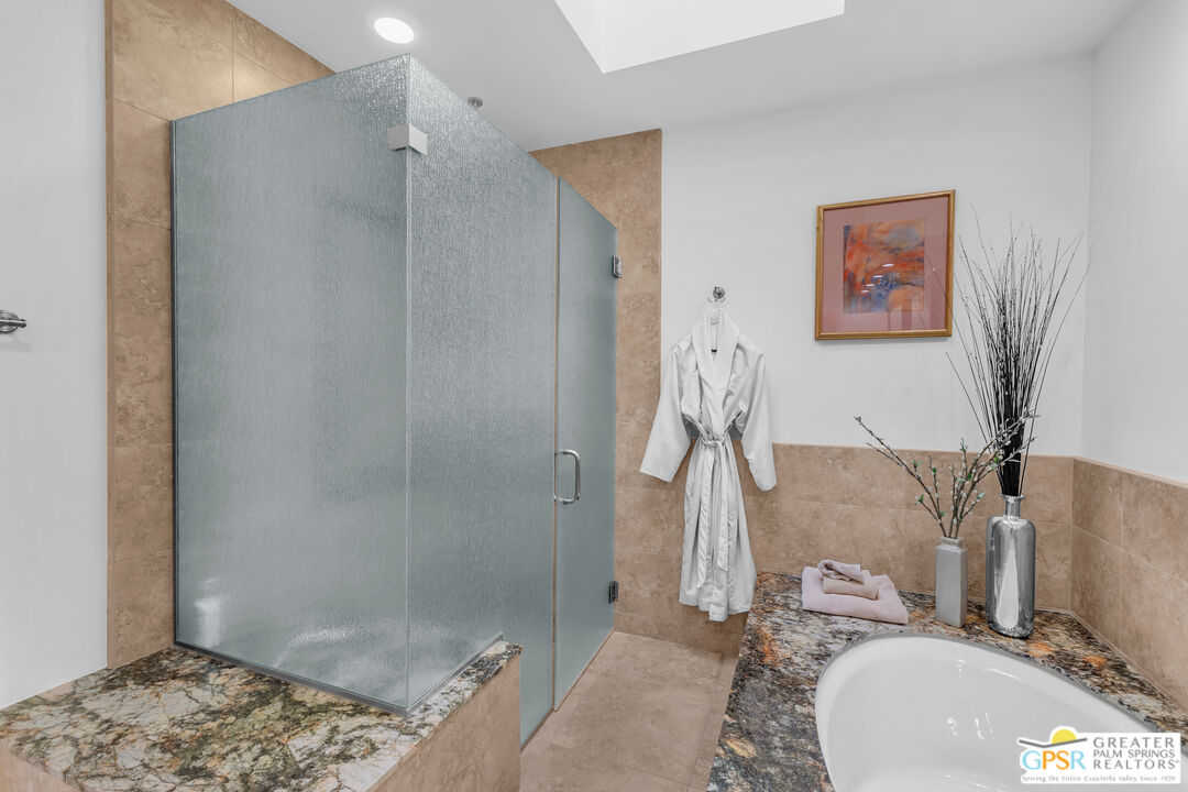 10 Colgate Drive Rancho Mirage, CA 92270 - Photo 30 of 45 a bathroom with a sink toilet and shower