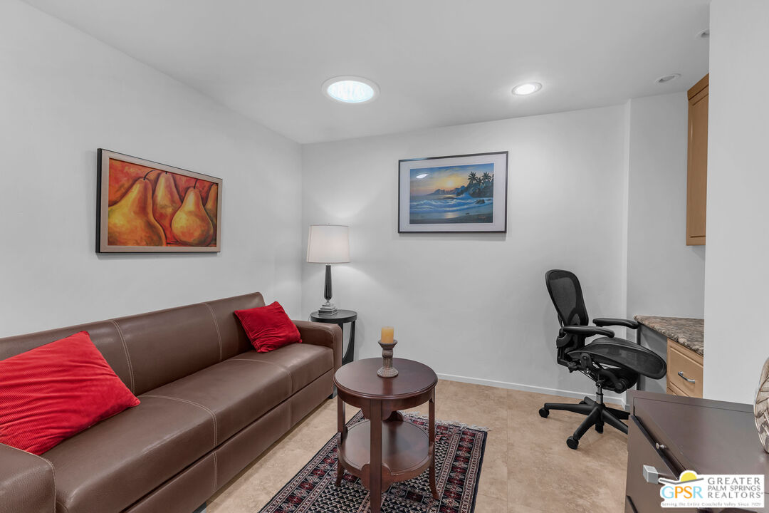 10 Colgate Drive Rancho Mirage, CA 92270 - Photo 31 of 45 a view of a livingroom with workspace and a couch