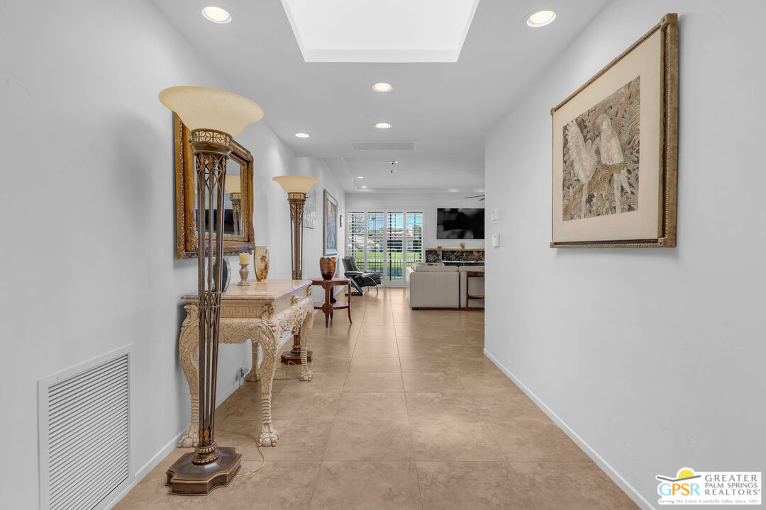 10 Colgate Drive Rancho Mirage, CA 92270 - Photo 4 of 45 a view of a living room and kitchen with furniture