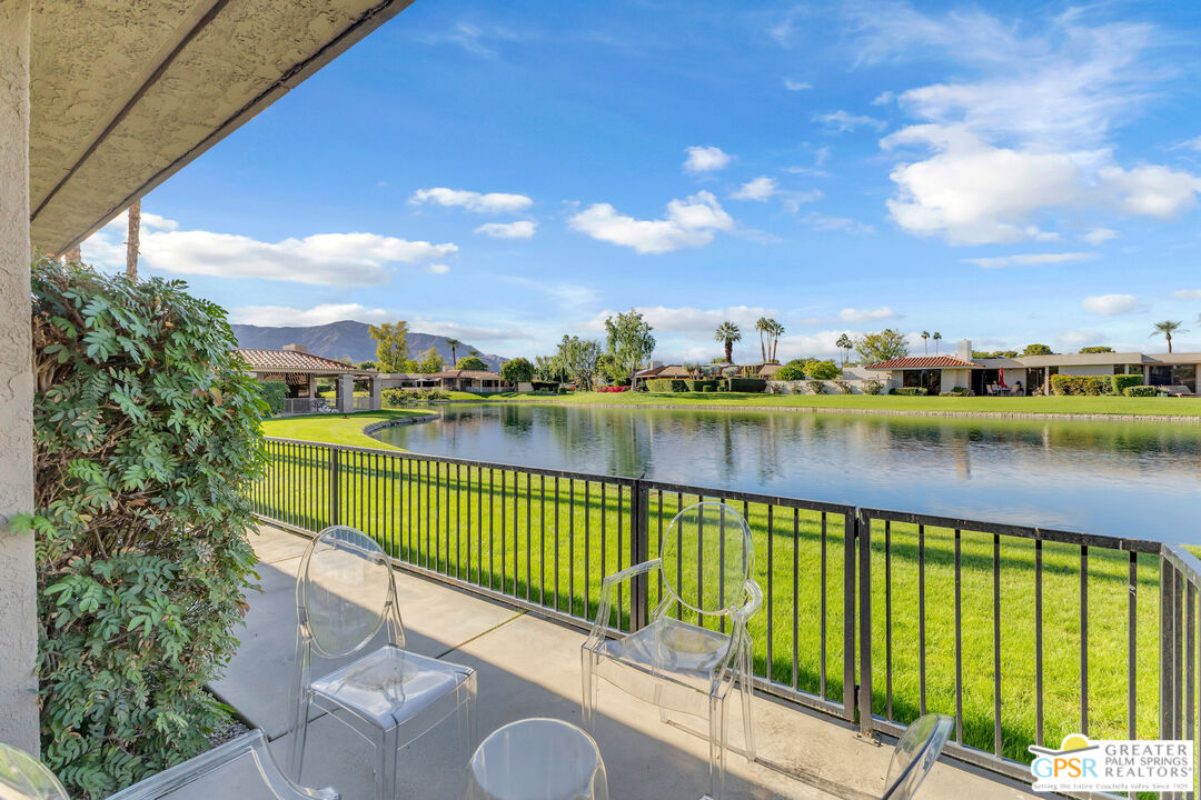 10 Colgate Drive Rancho Mirage, CA 92270 - Photo 9 of 45 a view of a lake with a houses