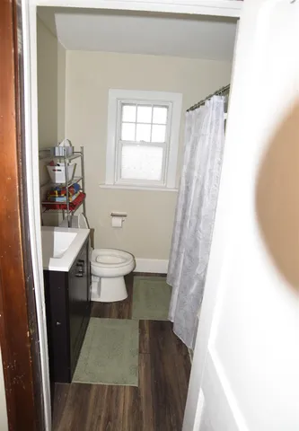 a bathroom with a sink and a toilet