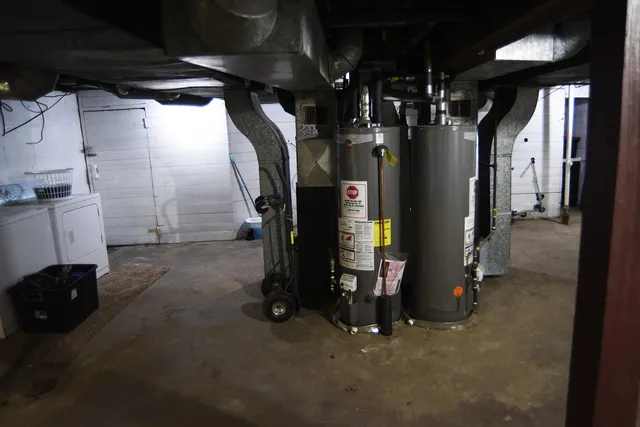 a view of water heater room with window