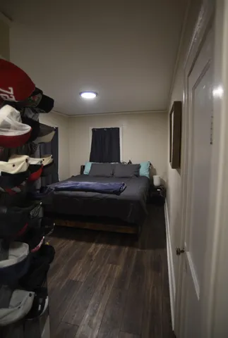 a room with a closet and a mirror