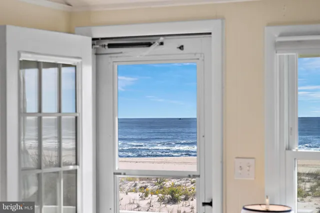 a bedroom with two beds and a window