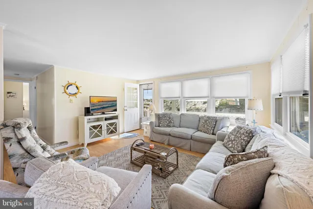 a dining room with a table and chairs