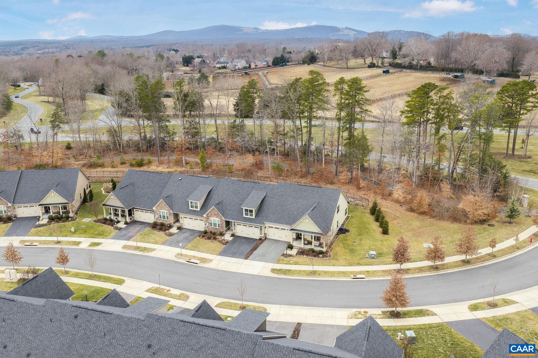 360 Winding Road Keswick, VA 22947 - Photo 42 of 48 a view of swimming pool with a lake view