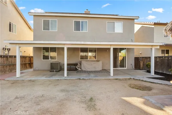 a view of a house with a patio