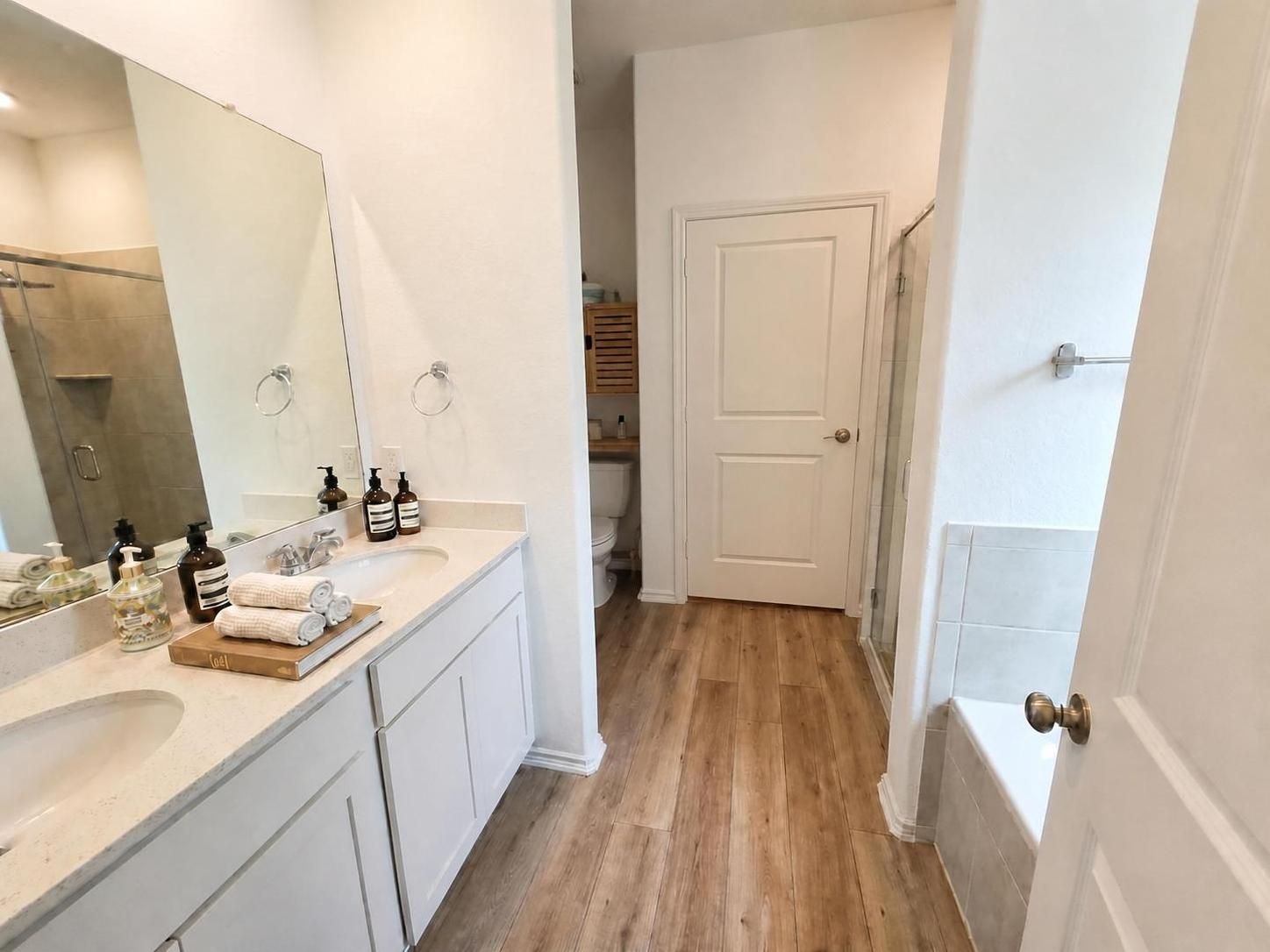 208 Wolf Springs Road Georgetown, TX 78628 - Photo 15 of 32 Double vanity and modern fixtures enhance this well-appointed bath.