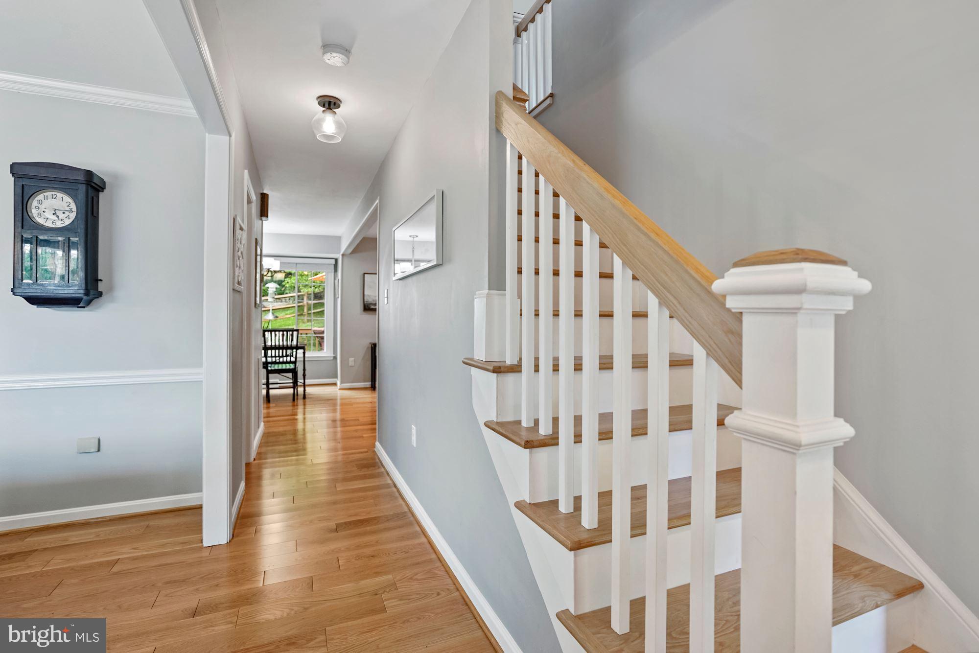 8810 Shadowlake Way Springfield, VA 22153 - Photo 6 of 41 Wide-plank hardwoods and stairs installed in 2022
