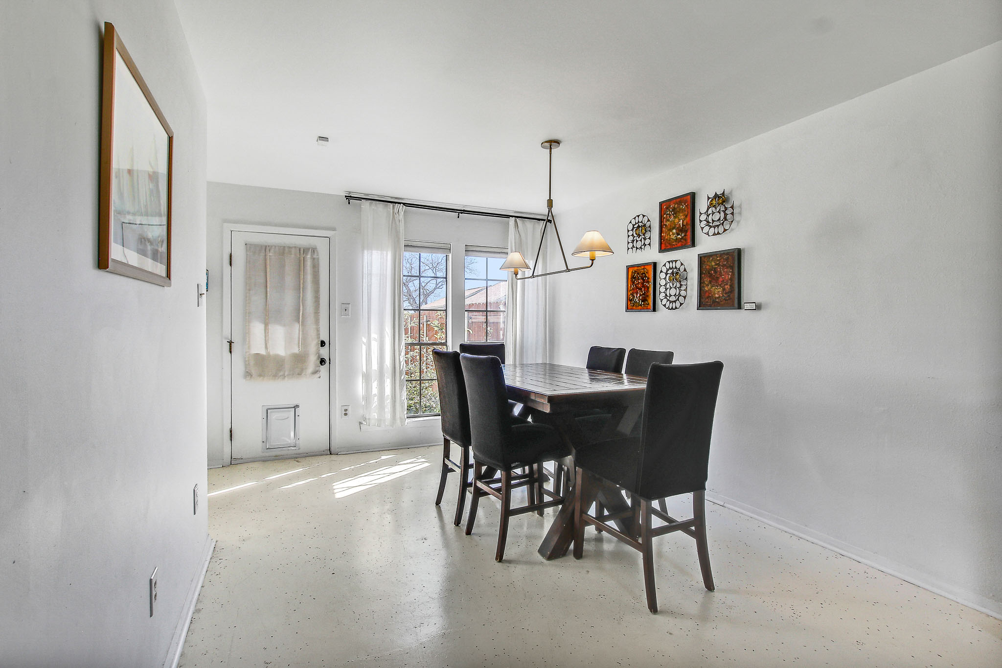 8925 North Plaza, Unit 69 Austin, TX 78753 - Photo 14 of 29 a view of a dining room with furniture