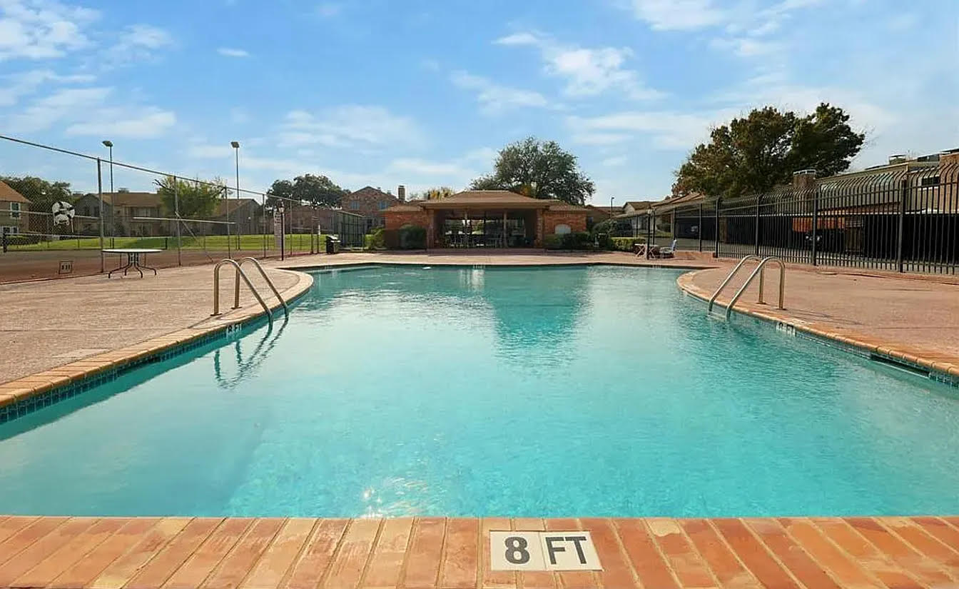 8925 North Plaza, Unit 69 Austin, TX 78753 - Photo 27 of 29 a view of a swimming pool with a lake view