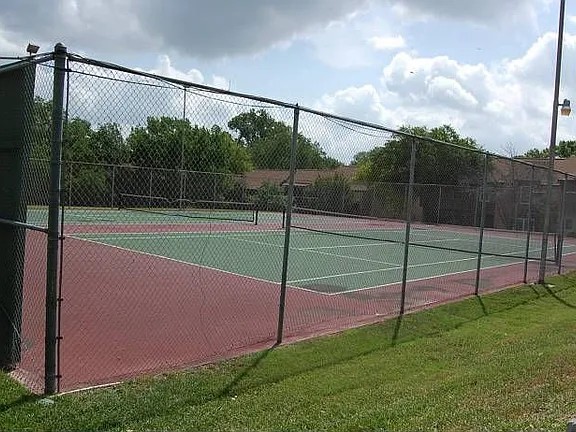 8925 North Plaza, Unit 69 Austin, TX 78753 - Photo 29 of 29 a view of a backyard