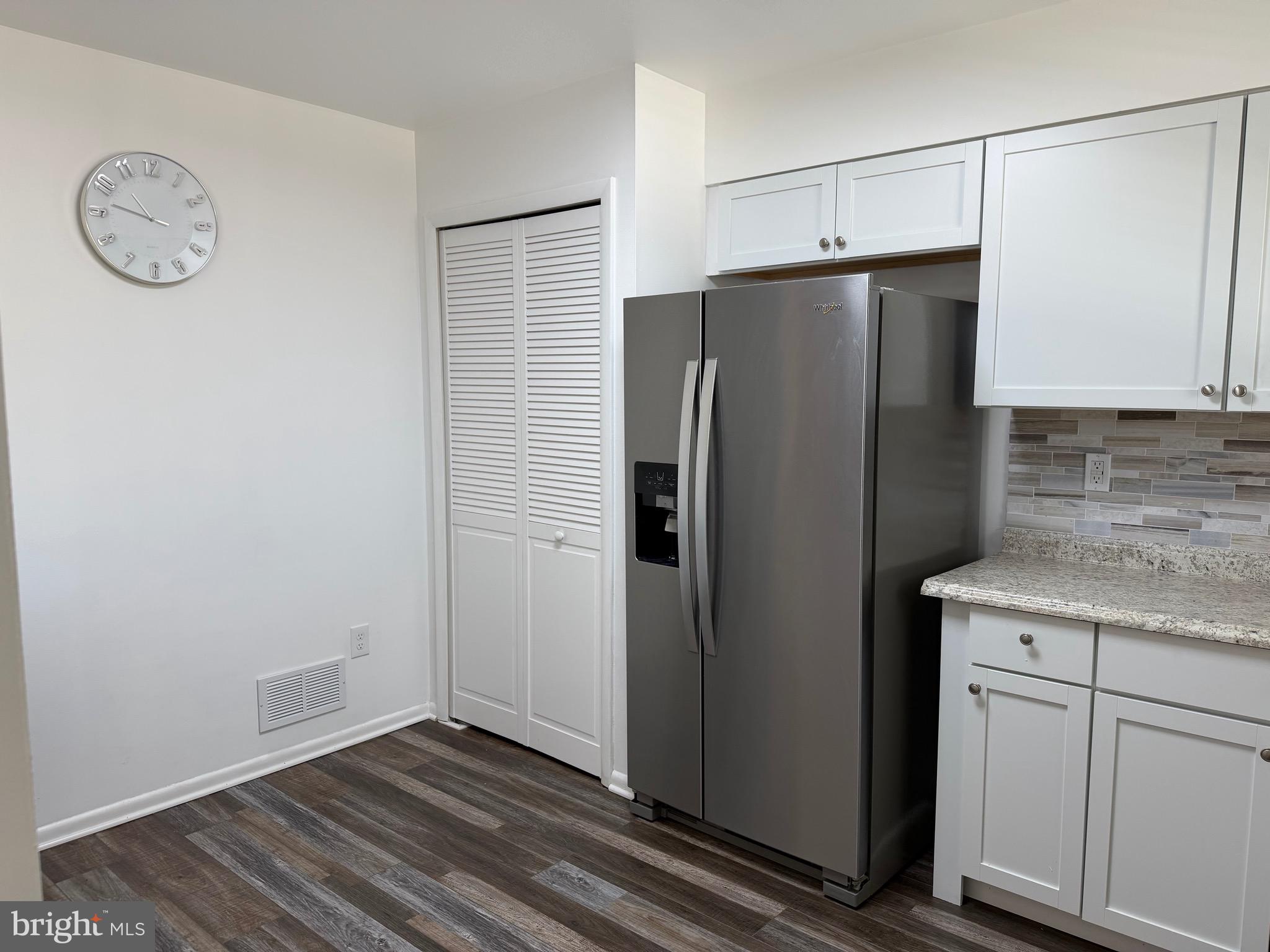 18 Jameson Lane Baltimore, MD 21208 - Photo 11 of 39 a kitchen with a refrigerator and a sink