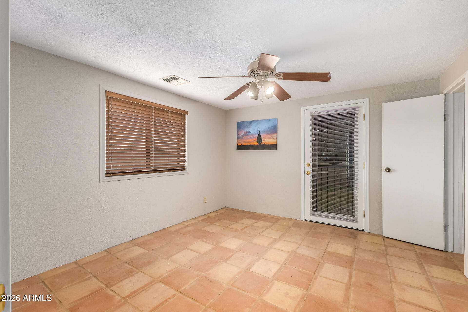 8714 North Dead Mans Gulch Road Florence, AZ 85132 - Photo 15 of 39 a view of an empty room with a window