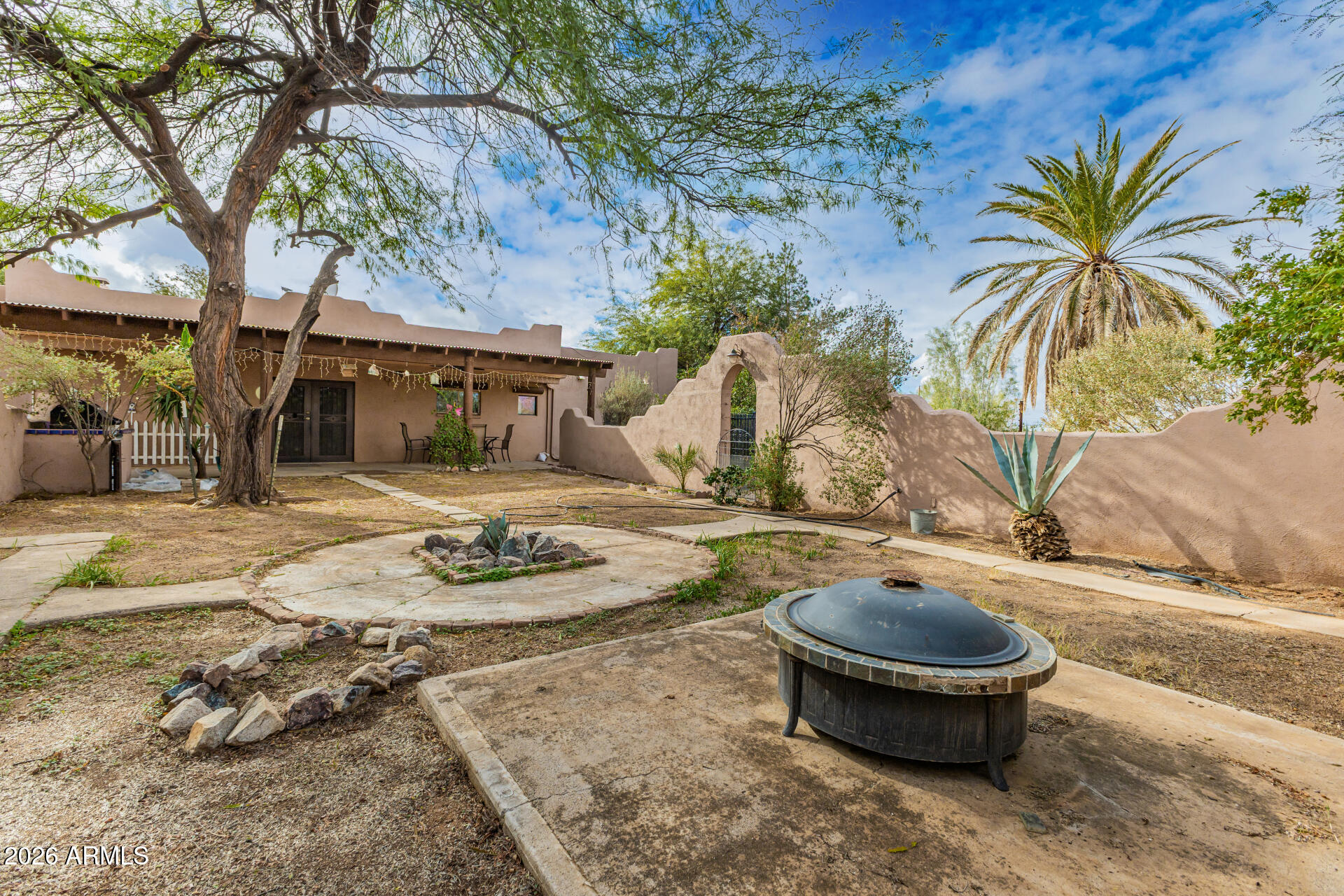 8714 North Dead Mans Gulch Road Florence, AZ 85132 - Photo 21 of 39 a front view of a house with garden