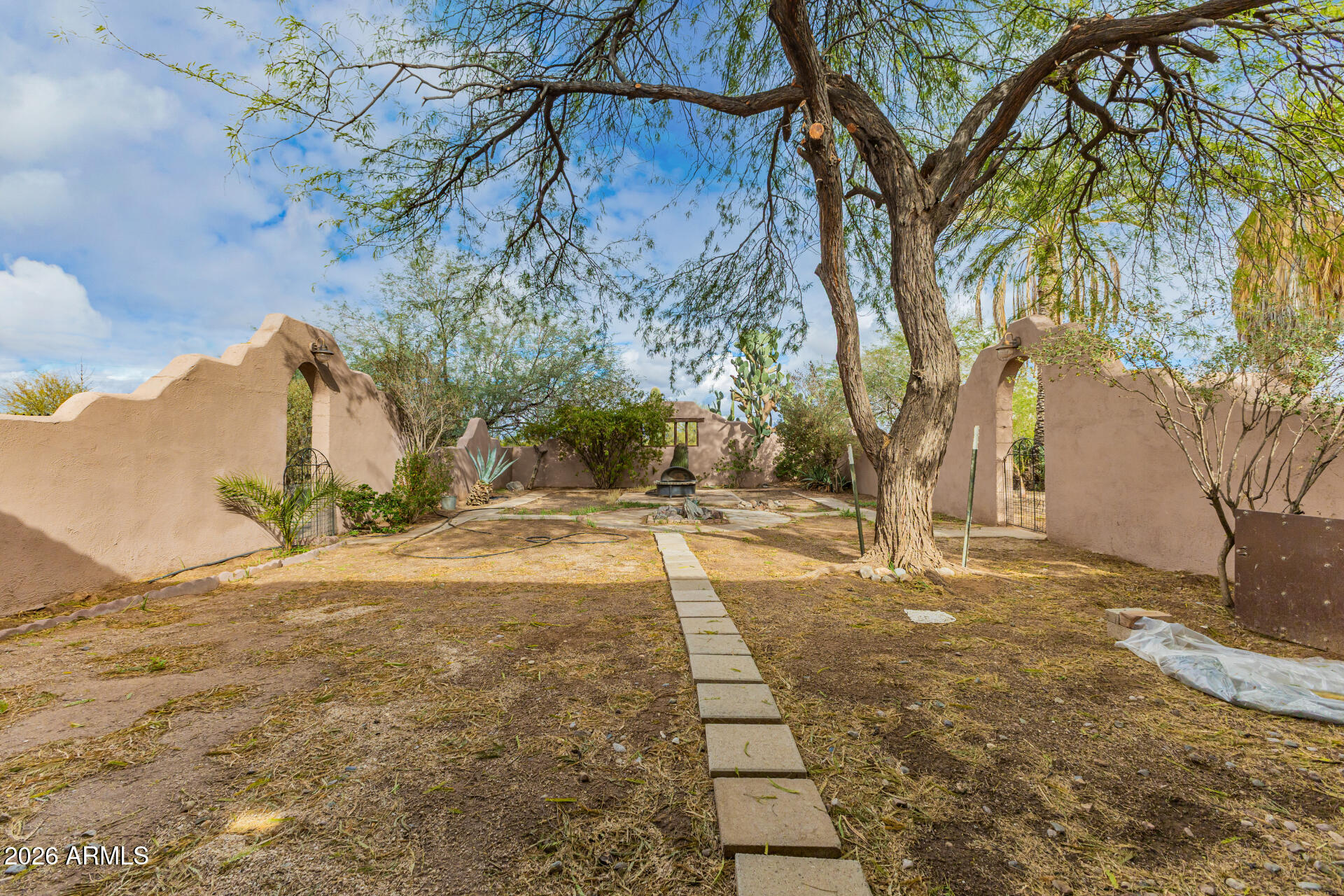 8714 North Dead Mans Gulch Road Florence, AZ 85132 - Photo 24 of 39 a view of a yard with plants and trees
